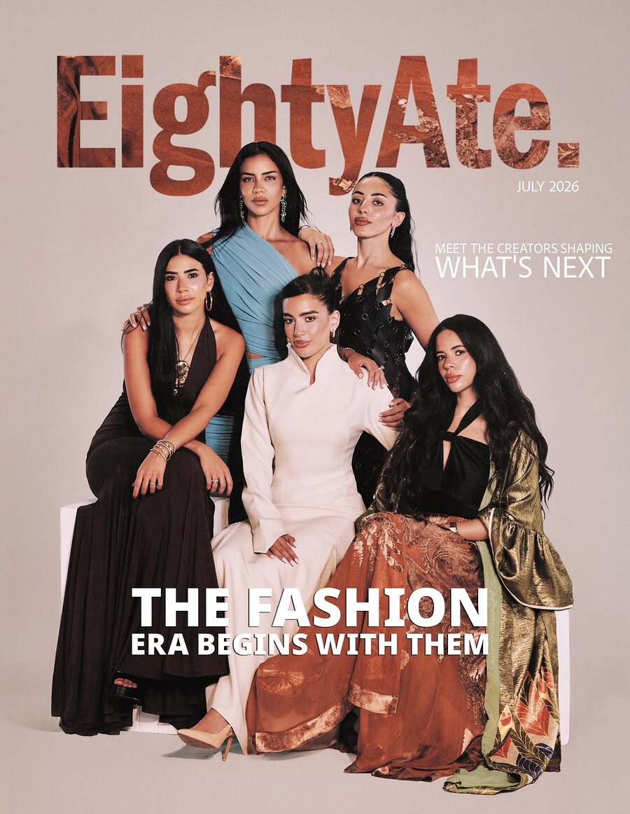 Eighty Ate magazine, July 2026 cover, with a woman in a cream high-collared amnou dress at the centre